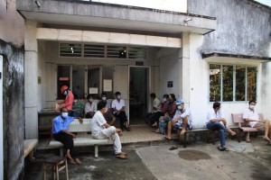 Patients waiting for treatment outside a clinic in Vietnam