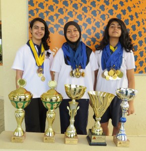 From left: Salma, Saidatul and Rhea with their medals and trophies from earlier heats of the World Scholars Cup.