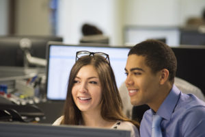 young office workers discussing