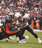 Field of dreams: Alumnus Darryl Sharpton sharpton-tackle-300