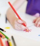 iStock_Child_Drawing_Colouring_Pencil 8x12