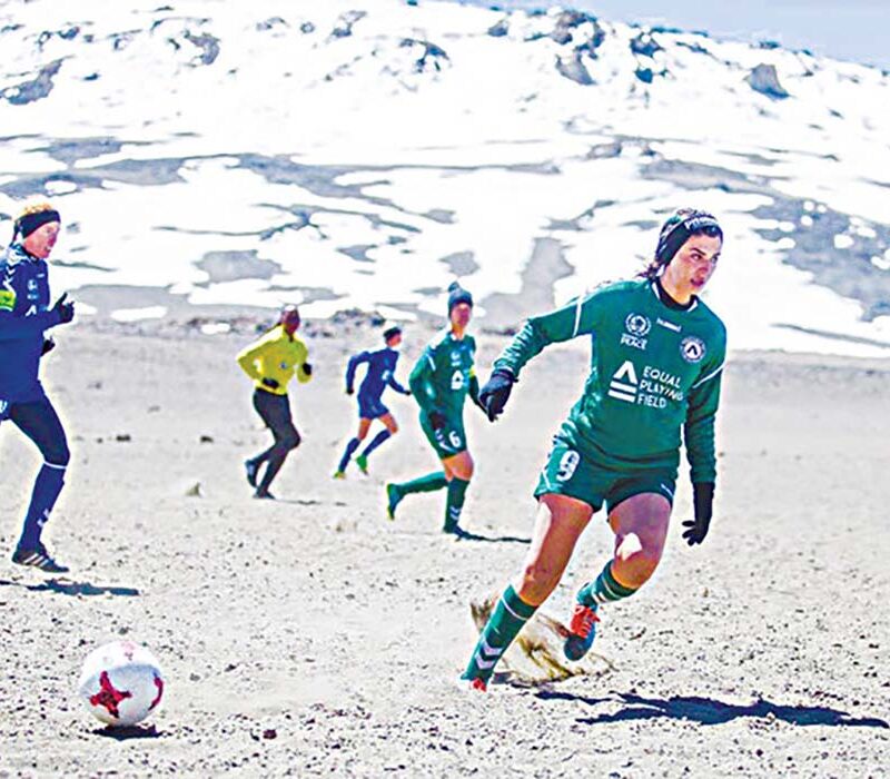 Saja Kamal and other Equal Playing Field (EPF) players competing in a match on Mount Kilimajaro.