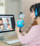 Asian woman teacher teaching geography via video conference e-learning and cheerful elementary school student looking at globe, Homeschooling and distance learning ,online ,education and internet.